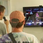 Big Sea employees playing Rock Band during Ship It Day 2019