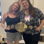 Chasity and Kristin celebrate their winning project during Ship It Day 2019