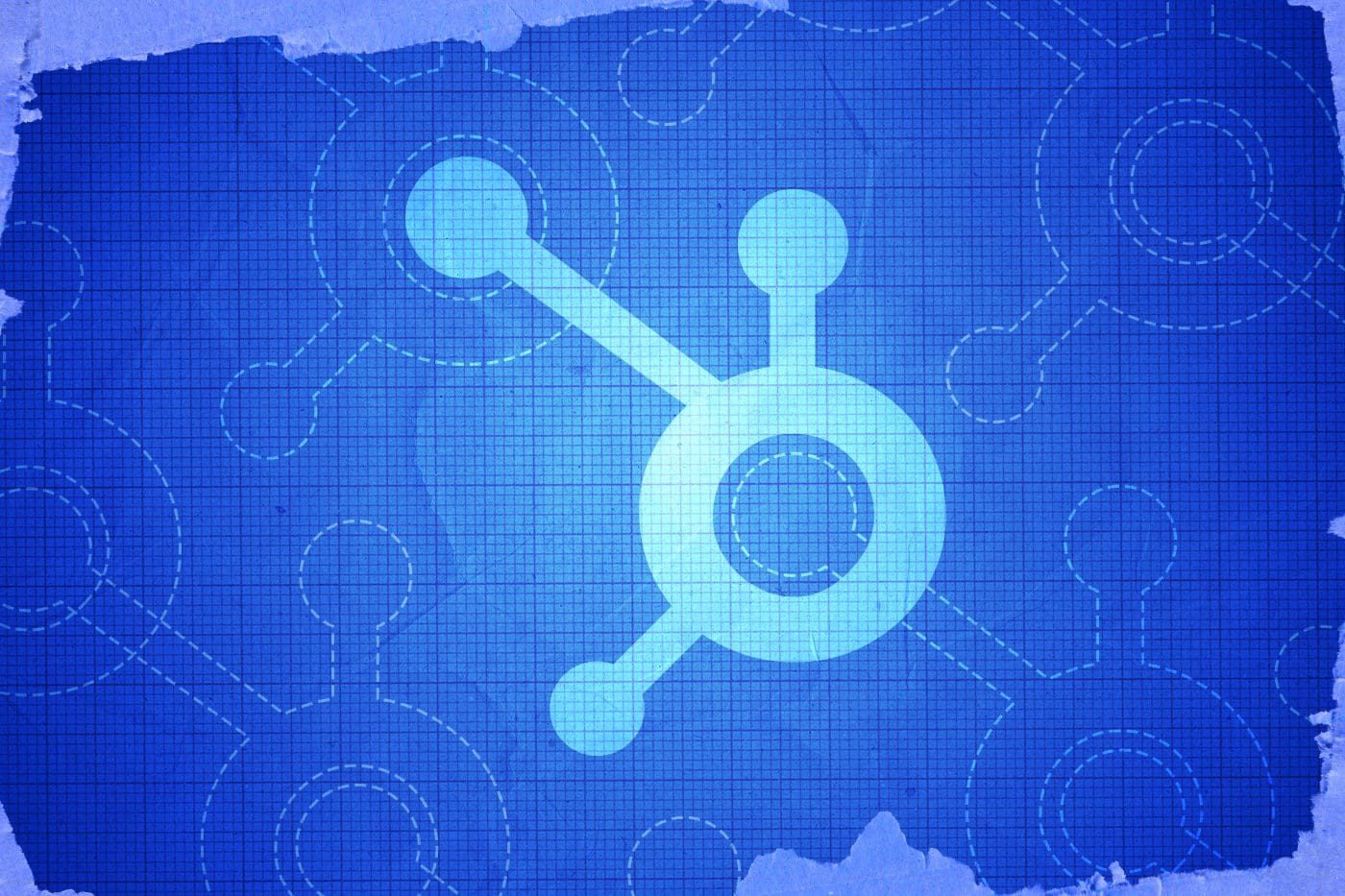 Blue graphic with HubSpot logo representing essential integrations for nonprofit marketing teams.