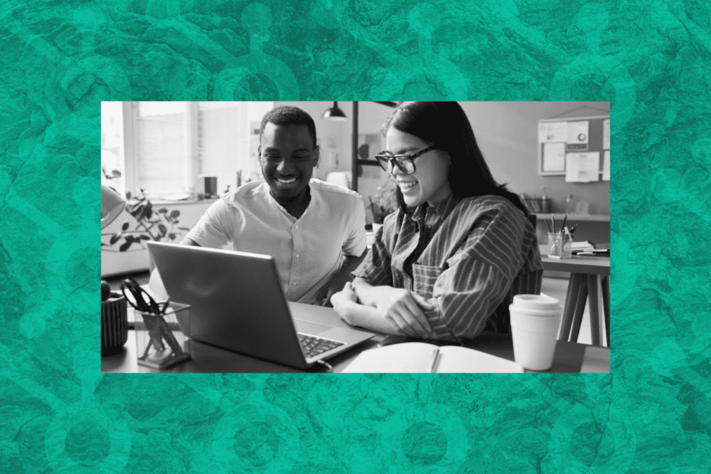 Co-workers sharing in the success of automating their marketing work with HubSpot AI.